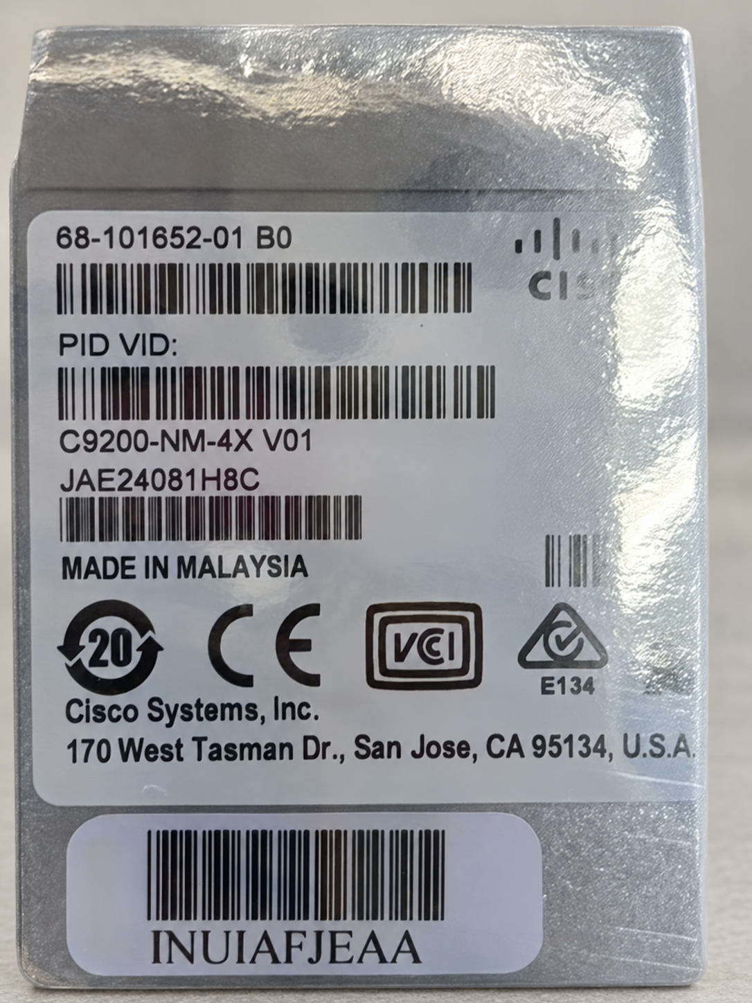 Cisco C9200-NM-4X — Product and packaging · Illustrative photography